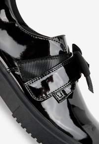 Next Schnürer - black