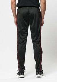 Kappa BANDA ASTORIA - Pantaloni de trening - black racing red