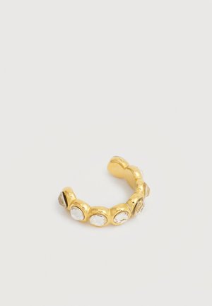 Åben ring i guldfarve med fem runde, klare ædelstene jævnt fordelt rundt om båndet, vist på en simpel hvid baggrund.