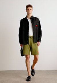 HUGO DIZ - Pantaloni de trening - open green