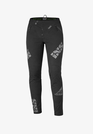 Schwarze Slim-Fit-Hose mit Reißverschlusstaschen, Knopf- und Reißverschlussverschluss sowie reflektierenden iXS-Logos an Oberschenkeln und Unterschenkeln.