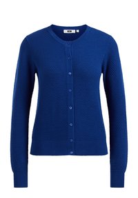 Blå stickad cardigan med ett texturerat mönster, långa ärmar, rund halsringning och knäppning framtill. Har matchande knappar.