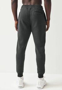 Next JOGGERS REGULAR FIT - Treniņtērpa apakšdaļas - slate grey