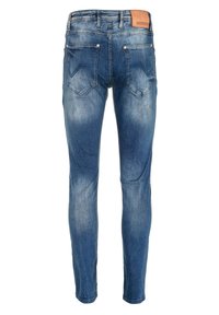 Schmal geschnittene blaue Jeans aus Denim mit einem verblassten Look, fünf Taschen und einem beigefarbenen Lederpatch am Bund. Verfügt über kontrastierende Nähte.