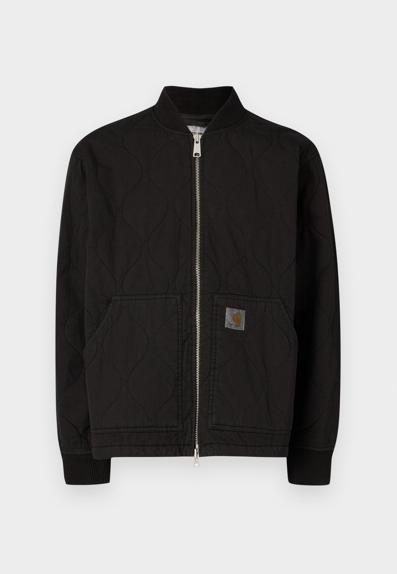 Black quilted bomber jacket with a ribbed collar, front zipper, and side pockets. Features a logo patch on the left pocket.