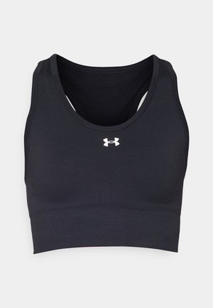 Débardeur de sport noir avec de larges bretelles, une texture lisse, des bandes côtelées en bas et un logo blanc au centre à l'avant.