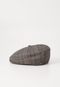 Flat cap in gray and black plaid wool blend, rounded shape, small top button, with a subtle logo tag on the side.