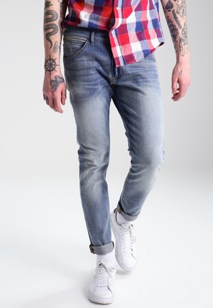 Vaqueros pitillo - bleached denim