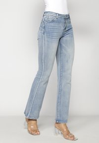 Koroshi Blugi bootcut - light blue