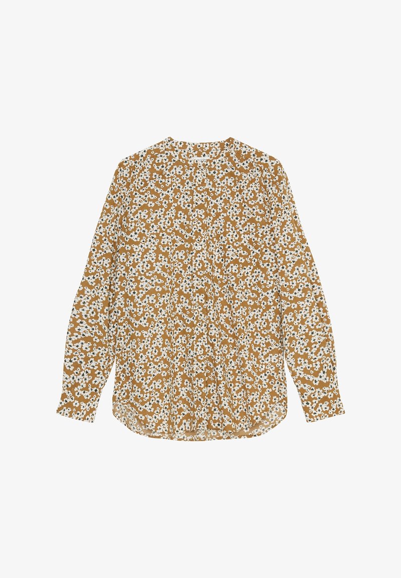 Blouse à manches longues boutonnée en marron clair avec petit imprimé floral blanc et noir, encolure ronde et ourlet légèrement arrondi.