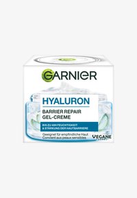 Żel-krem Hyaluron Barrier Repair w przezroczystym słoiku z przezroczystą pokrywką; zawiera zielone akcenty oraz tekst opisujący nawilżenie i wrażliwość skóry.