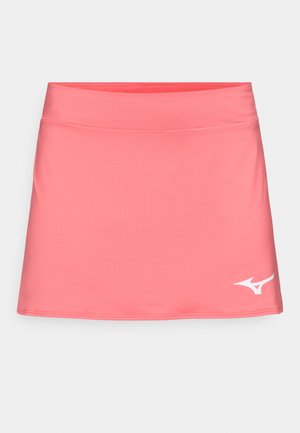 Pink sports nederdel lavet af strækstof, med en bred talje og et hvidt logo i nederste venstre hjørne. Glat tekstur, der går over knæet.
