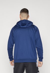 adidas Performance TIRO24 HOOD - Majica s kapuljačom - team navy blue/white