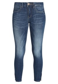Calças de ganga azul skinny com um efeito desbotado, design de cinco bolsos, fecho de botão e ligeira desfiagem na bainha.