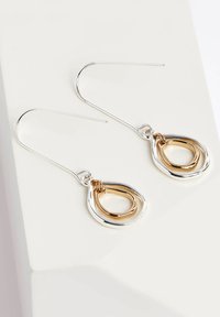 Next SHAPED DROP  - Cercei - gold silver tone