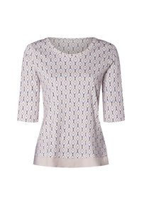 Helllila Bluse mit symmetrischem Augenmuster in Marineblau und Weiß. Mit Rundhalsausschnitt und drei Viertelärmeln, satinartigem Saum.