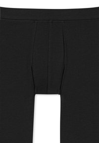 Schwarze Boxershorts aus elastischem Stoff mit Fronttasche, ausgestattet mit einem elastischen Bund und Ziernähten, glatte Textur.