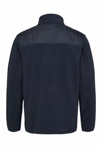 Jūras spēku vilnas jaka ar augstu apkakli, gludu audumu uz pleciem, garām piedurknēm un taisnu apakšmalu, bez redzamām rotājumām.