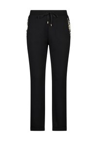  Sorte sweatpants med snøre i taljen, der har to sidelommer prydet med små dekorative nitter for ekstra detalje. Blød stoftekstur.