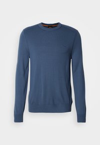 Blue knit sweater with a crew neckline, ribbed cuffs, and hem. Features a subtle logo on the chest and a smooth texture.