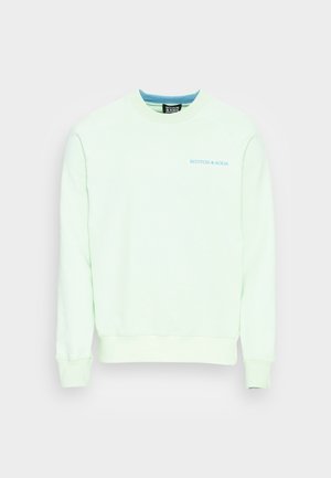 Lysegrøn crewneck sweatshirt med ribkant ved ærmer og bund, med lille lyseblåt "Scotch & Soda" logo på venstre bryst.