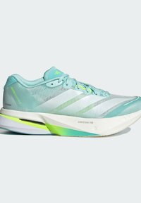 Lagani trkački tenisice u aqua boji s mrežastim gornjim dijelom, teksturiranim prugama i istaknutim zelenim naglascima. Sadrže kvalitetan midsole za amortizaciju i tanak dizajn.