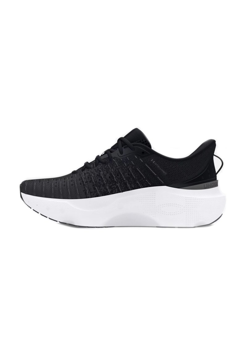 Black athletic shoe with a textured upper and a contrasting white midsole. Features lacing system and a pull tab at the heel.