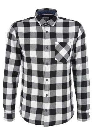 Koszula w czarno-białą kratę z długim rękawem, zapinana na guziki, z przednią lewą kieszenią na piersi i klasycznym kołnierzykiem.