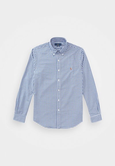 Blue and white checkered long-sleeve shirt with a button-down collar and a small embroidered logo on the chest. Cotton material.