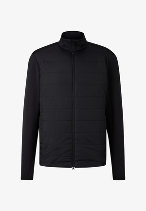Veste noire avec fermeture éclair, devant rembourré et manches lisses, featuring un col haut et des contrastes de texture subtils.
