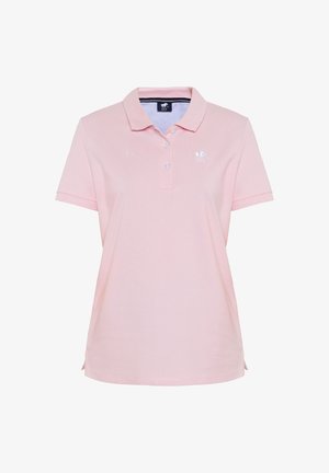 Light pink polo shirt, short sleeves, collared design, three buttons at neckline, embroidered logo on left chest, soft fabric texture.