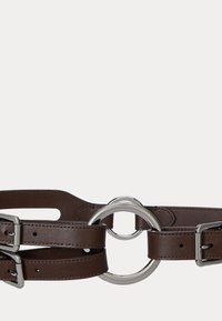 Brown leather belt with silver metal hardware, featuring a central circular ring and adjustable buckle closures on each side.