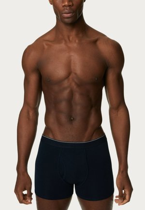 Navy blue boxer shorts made of soft cotton. Features a snug fit, elastic waistband with a contrasting trim, and a front pouch design.