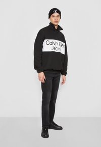 Calvin Klein Jeans BOLD LOGO COLORBLOCK ZIP UNISEX - Sweatshirt - black