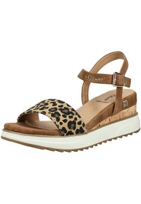 Leopard print upper with tan suede accents, adjustable ankle strap, cork-wedge heel, and white platform sole with textured tread.