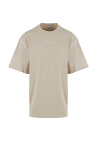 Beige cotton t-shirt with a relaxed fit, short sleeves, and a white signature logo on the front. Smooth texture and simple design.