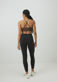 Puma W SHAPELUXE - Leggings - black