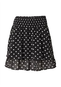 Zwart rok met witte stippen, voorzien van een smocked tailleband en een gelaagde rucheszoom, gemaakt van lichtgewicht stof.