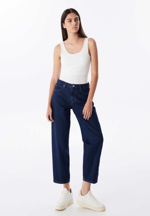 Vaqueros tapered - d indigo