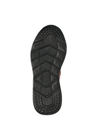 Black rubber shoe sole with a textured surface, featuring a zigzag tread pattern and geometric shapes for grip and traction.
