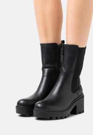 mtng, Bottines à plateau - black