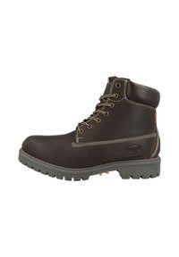 Stivaletto alla caviglia in pelle marrone con suola in gomma grigia, punta rinforzata, dettagli cuciti e occhielli in metallo per i lacci. Dettaglio del marchio laterale visibile.