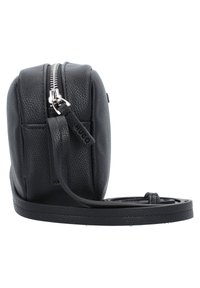 Black textured leather crossbody bag with a double zipper, adjustable strap, and logo detail. Rectangular shape with a compact design.
