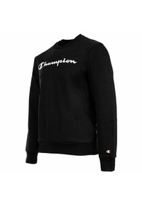Schwarzer Langarm-Sweatshirt mit weißem "Champion"-Logo über der Brust und kleinem Logo am linken Handgelenk.