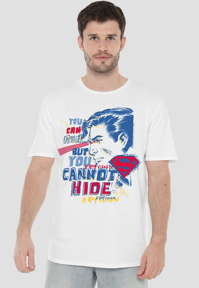 White cotton t-shirt featuring a colorful graphic design with text and an illustrated face. Notable red and blue accents, relaxed fit.