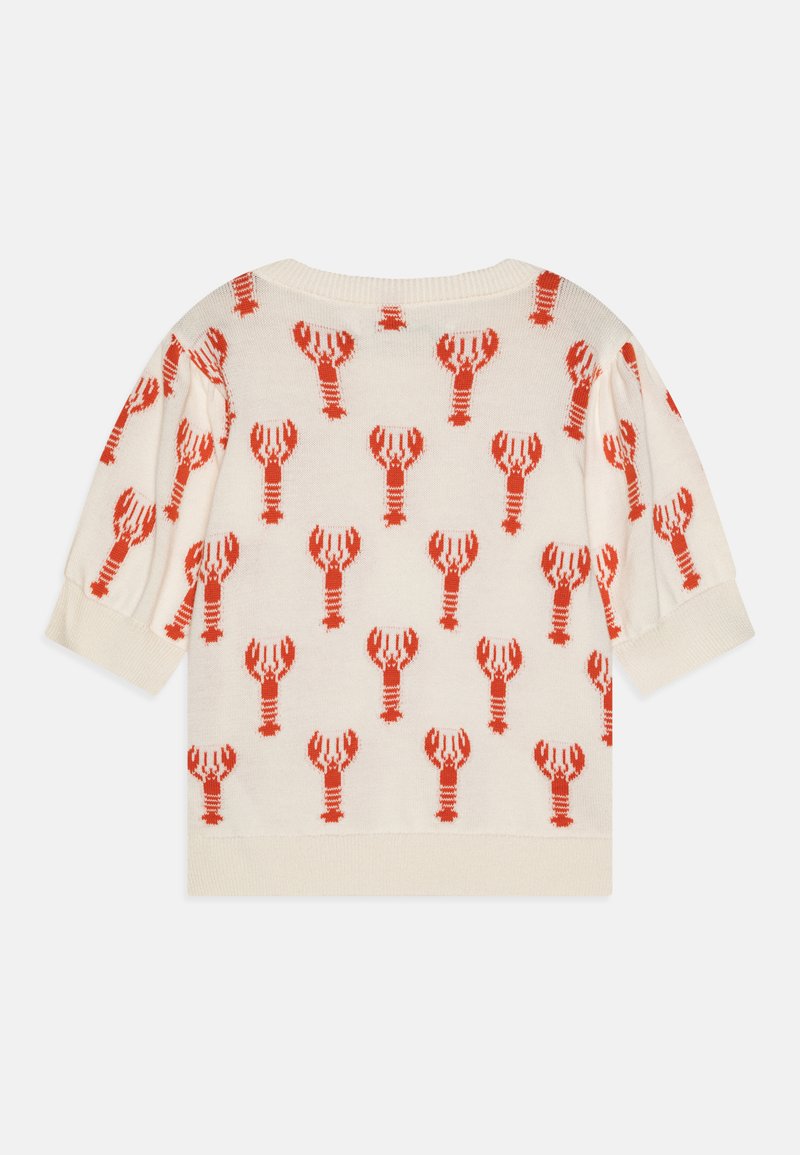Krabbenmuster gestrickter Pullover in Creme mit leuchtend roten Akzenten, kurzen Ärmeln und lockerer Passform. Strukturiertes Material.