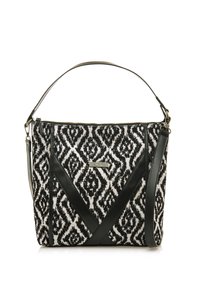 Sac à main en tissu à motifs noir et blanc avec un design structuré, présentant des accents en cuir noir et une bandoulière amovible.