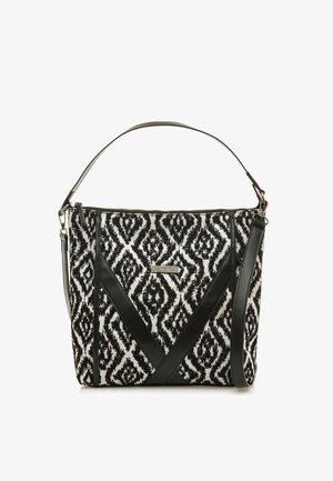 Sac à main en tissu à motifs noir et blanc avec un design structuré, présentant des accents en cuir noir et une bandoulière amovible.