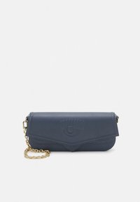 Navy leather clutch with a gold chain strap, featuring an embossed eye design and a folded flap closure. Smooth texture and geometric shape.