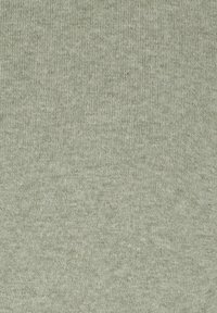Lys grønn stoff med en strikket tekstur og fin ribbing, jevn utseende, ingen mønstre eller accenter, myk og glatt finish.